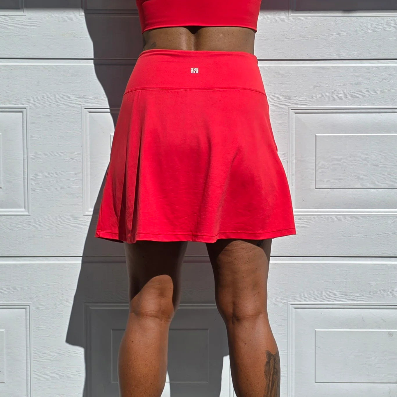 She Did running skirt red